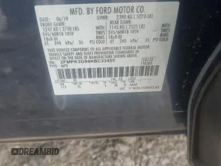 2019 Ford Edge SE z VIN 2FMPK3G94KBC33455, wystawiony jako Copart lot #64469655 z przebiegiem 22 634 mil mil oraz Szkoda całkowita • Salvage title. Historia ofert i sprzedaży dostępna na DreamBid. Obrazek 13.