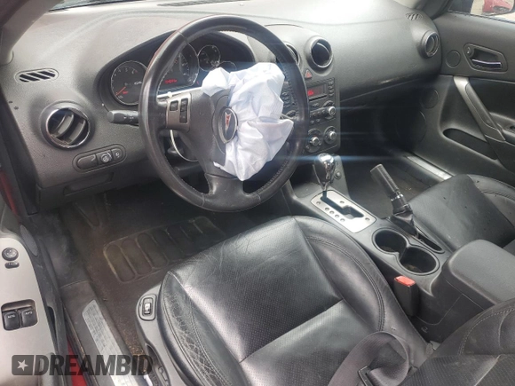 2006 Pontiac G6 GT with VIN 1G2ZH158664144243, listed as a Copart auction lot 57622335 with 104,684 mi miles and Salvage title. Bid and sale history available at DreamBid. Image 8.