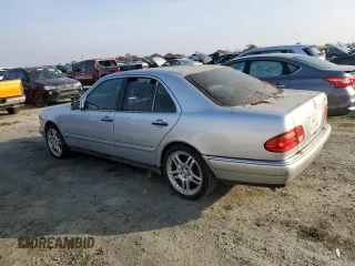 1997 Mercedes-Benz E-Class with VIN WDBJF72F6VA523987, listed as a Copart auction lot 82932444 with 216,038 mi miles and Clean Title. Bid and sale history available at carsss.com. Image 2.
