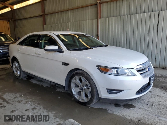 2012 Ford Taurus SEL z VIN 1FAHP2HW8CG133657, wystawiony jako Copart lot #52865895 z przebiegiem 132 876 mil mil oraz Szkoda całkowita • Salvage title. Historia ofert i sprzedaży dostępna na DreamBid. Obrazek 4.