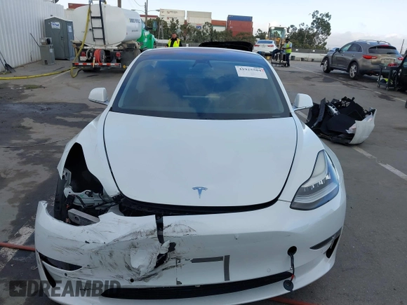 2018 Tesla Model 3 Long Range Battery with VIN 5YJ3E1EA3JF023300, listed as a IAAI auction lot 41925504 with 100,512 mi miles and . Bid and sale history available at DreamBid. Image 13.