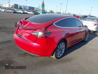 2018 Tesla Model 3 Long Range Battery with VIN 5YJ3E1EA3JF035785, listed as a IAAI auction lot 41986774 with 33,965 mi miles and . Bid and sale history available at DreamBid. Image 4.
