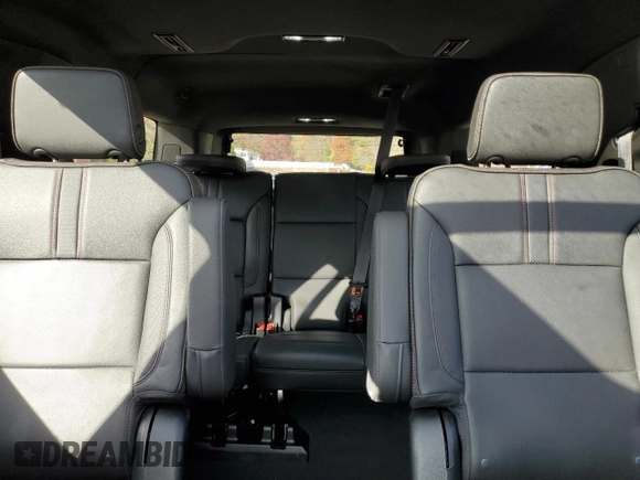 2023 Chevrolet Suburban RST with VIN 1GNSKEKDXPR293788, listed as a Copart auction lot 77902924 with 75,245 mi miles and Salvage title. Bid and sale history available at DreamBid. Image 10.