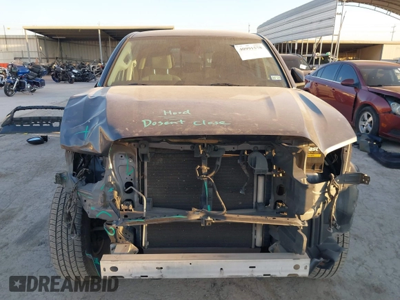 2021 Toyota Tacoma SR z VIN 3TYAX5GN2MT020997, wystawiony jako IAAI lot #40991578 z przebiegiem 81 509 mil mil oraz . Historia ofert i sprzedaży dostępna na DreamBid. Obrazek 12.