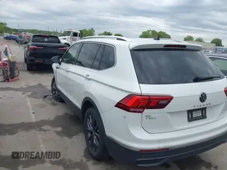 2023 Volkswagen Tiguan SE with VIN 3VVMB7AX0PM036876, listed as a IAAI auction lot 42023415 with 42,003 mi miles and . Bid and sale history available at DreamBid. Image 3.
