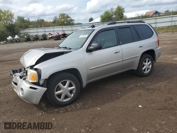 2007 GMC Envoy SLT with VIN 1GKDT13S272265100, listed as a Copart auction lot 73136264 with 245,198 mi miles and Salvage Title. Bid and sale history available at carsss.com. Image 1.
