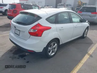 2013 Ford Focus SE with VIN 1FADP3K27DL298456, listed as a IAAI auction lot 42007399 with 111,210 mi miles. Bid and sale history available at carsss.com. Image 4.