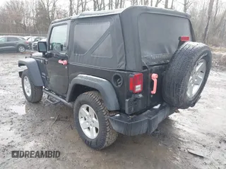 2017 Jeep Wrangler Sport z VIN 1C4GJWAG1HL502374, wystawiony jako IAAI lot #41938257 z przebiegiem 95 469 mil mil oraz . Historia ofert i sprzedaży dostępna na DreamBid. Obrazek 3.