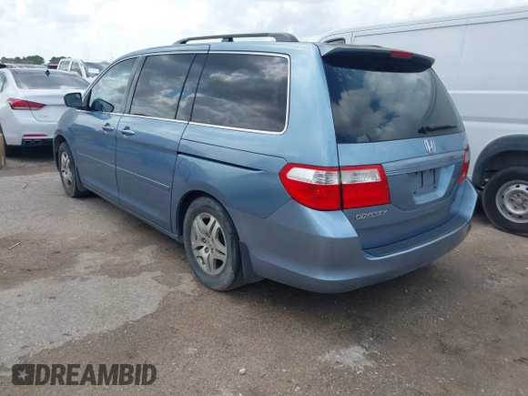 2007 Honda Odyssey EX-L with VIN 5FNRL38647B085123, listed as a IAAI auction lot 42154519 with 168,587 mi miles and . Bid and sale history available at carsss.com. Image 3.
