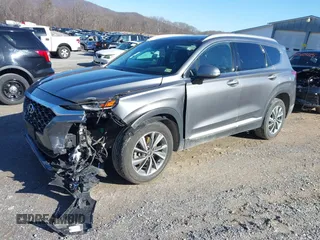 2019 Hyundai Santa Fe Limited with VIN 5NMS5CAD3KH033218, listed as a IAAI auction lot 41509237 with 95,152 mi miles. Bid and sale history available at carsss.com. Image 20.