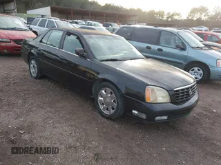 2002 Cadillac DeVille DTS with VIN 1G6KF57992U219921, listed as a IAAI auction lot 41261360 with 127,710 mi miles. Bid and sale history available at carsss.com. Image 1.