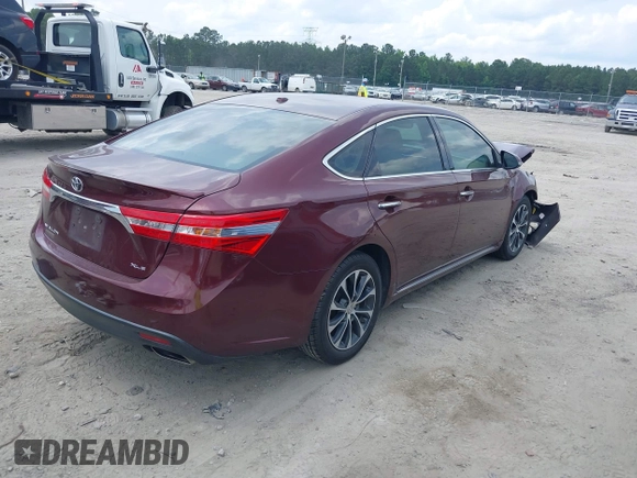 2014 Toyota Avalon Limited z VIN 4T1BK1EB5EU122996, wystawiony jako IAAI lot #42292676 z przebiegiem 157 690 mil mil oraz . Historia ofert i sprzedaży dostępna na DreamBid. Obrazek 4.