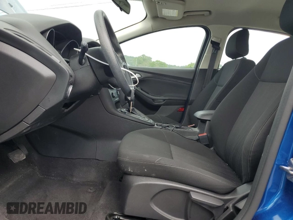 2018 Ford Focus SE with VIN 1FADP3F23JL214428, listed as a Copart auction lot 60552465 with 33,699 mi miles and Salvage title. Bid and sale history available at DreamBid. Image 5.
