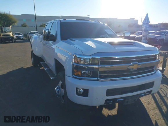 2018 Chevrolet Silverado 3500HD High Country with VIN 1GC4K1EY6JF207068, listed as a IAAI auction lot 41288394 with 110,158 mi miles and . Bid and sale history available at DreamBid. Image 1.