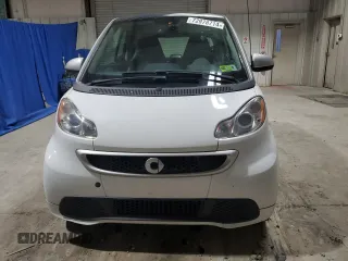 2015 Smart fortwo Passion z VIN WMEEJ3BA5FK814542, wystawiony jako Copart lot #72978714 z przebiegiem 60 081 mil mil oraz Czysty tytuł • Clean title. Historia ofert i sprzedaży dostępna na DreamBid. Obrazek 5.