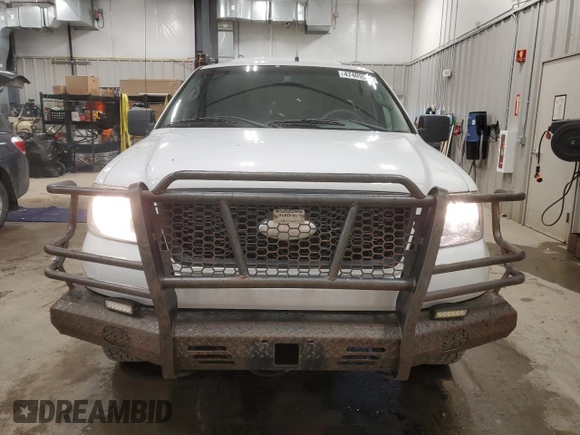 2006 Ford F-150 XL with VIN 1FTRF14596NA66799, listed as a Copart auction lot 47409015 with 303,447 mi miles and Clean Title. Bid and sale history available at carsss.com. Image 5.