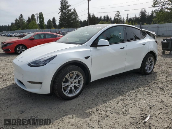2020 Tesla Model Y Long Range with VIN 5YJYGDEF2LF006357, listed as a Copart auction lot 54888215 with 55,983 mi miles and Salvage Title. Bid and sale history available at DreamBid. Image 1.