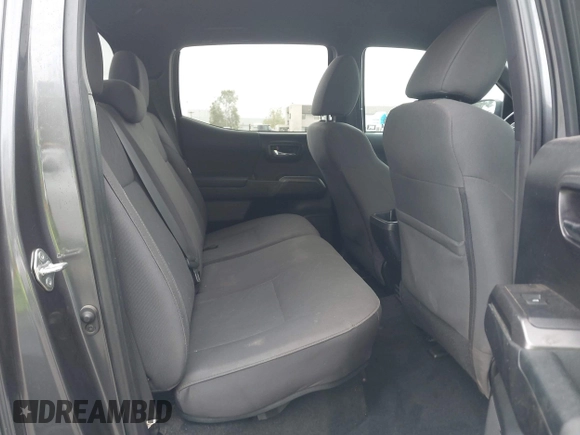 2018 Toyota Tacoma SR5 with VIN 3TMAZ5CN1JM071396, listed as a IAAI auction lot 42061640 with 122,148 mi miles and . Bid and sale history available at DreamBid. Image 8.