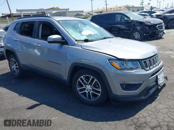 2018 Jeep Compass Latitude with VIN 3C4NJCBBXJT102753, listed as a IAAI auction lot 42379577 with 98,423 mi miles and . Bid and sale history available at DreamBid. Image 1.