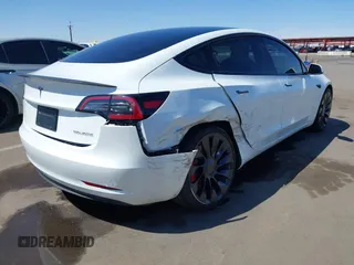 2023 Tesla Model 3 Performance z VIN 5YJ3E1EC7PF432748, wystawiony jako IAAI lot #41841913 z przebiegiem 36 043 mil mil oraz . Historia ofert i sprzedaży dostępna na DreamBid. Obrazek 4.