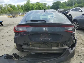2024 Honda Civic LX z VIN 19XFL2H52RE017237, wystawiony jako Copart lot #56076635 z przebiegiem 20 999 mil mil oraz Szkoda całkowita • Salvage title. Historia ofert i sprzedaży dostępna na DreamBid. Obrazek 6.