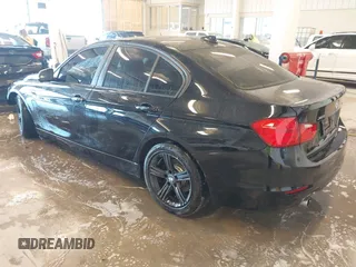 2015 BMW 3 Series 320i xDrive with VIN WBA3C3C56FK203031, listed as a IAAI auction lot 41012182 with 83,611 mi miles and . Bid and sale history available at DreamBid. Image 3.