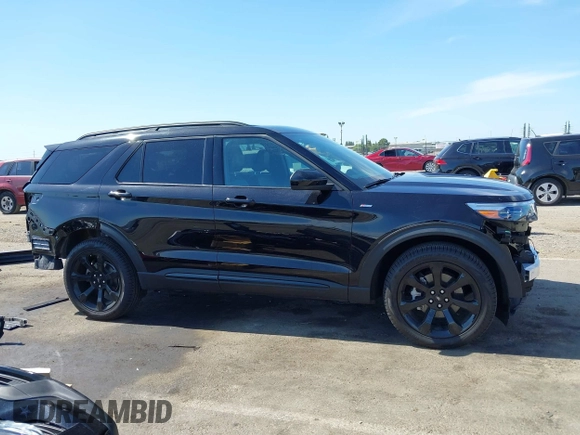 2023 Ford Explorer ST-Line z VIN 1FMSK8KH7PGC03436, wystawiony jako IAAI lot #42359119 z przebiegiem 5 261 mil mil oraz . Historia ofert i sprzedaży dostępna na DreamBid. Obrazek 14.