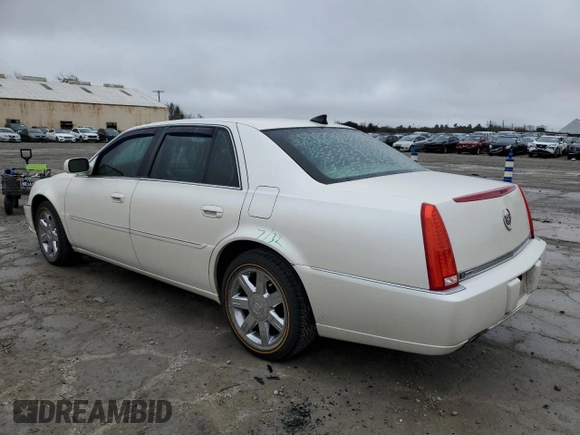 2011 Cadillac DTS with VIN 1G6KA5E63BU150750, listed as a Copart auction lot 43568135 with 100,117 mi miles and Salvage Title. Bid and sale history available at DreamBid. Image 2.