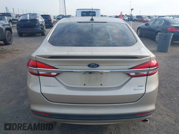 2018 Ford Fusion SE z VIN 3FA6P0HD6JR279927, wystawiony jako IAAI lot #42430172 z przebiegiem 145 080 mil mil oraz . Historia ofert i sprzedaży dostępna na DreamBid. Obrazek 16.