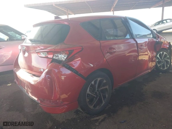 2016 Scion iM with VIN JTNKARJE5GJ507626, listed as a IAAI auction lot 41560827 with 99,094 mi miles. Bid and sale history available at carsss.com. Image 4.