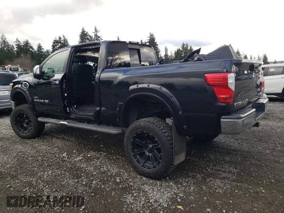 2016 Nissan Titan XD Platinum Reserve with VIN 1N6BA1F49GN500481, listed as a Copart auction lot 88679525 with 42,820 mi miles and Salvage Title. Bid and sale history available at carsss.com. Image 2.