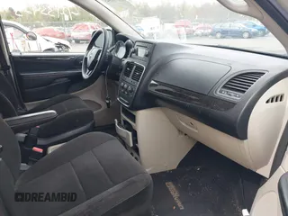 2012 Dodge Grand Caravan SE with VIN 2C4RDGBG4CR298996, listed as a IAAI auction lot 42133423 with 70,354 mi miles and . Bid and sale history available at DreamBid. Image 5.