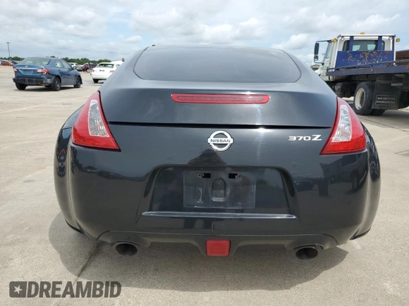2016 Nissan 370Z with VIN JN1AZ4EH8GM936468, listed as a Copart auction lot 54618544 with 60,868 mi miles and Salvage Title. Bid and sale history available at carsss.com. Image 6.
