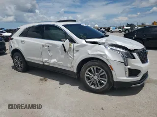 2021 Cadillac XT5 FWD Premium Luxury z VIN 1GYKNCR44MZ106982, wystawiony jako Copart lot #62234455 z przebiegiem 93 079 mil mil oraz Szkoda całkowita • Salvage title. Historia ofert i sprzedaży dostępna na DreamBid. Obrazek 4.