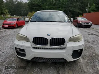 2014 BMW X6 xDrive35i z VIN 5UXFG2C5XE0C43042, wystawiony jako Copart lot #56151565 z przebiegiem Nie podano mil oraz Tytuł czysty. Historia ofert i sprzedaży dostępna na DreamBid. Obrazek 5.