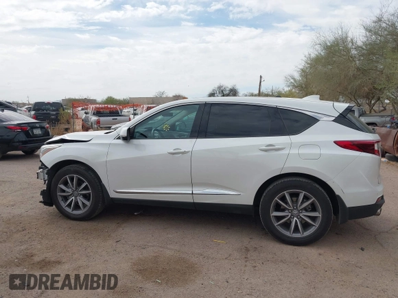 2021 Acura RDX w/Technology Package with VIN 5J8TC1H51ML022573, listed as a IAAI auction lot 41893265 with 56,516 mi miles. Bid and sale history available at carsss.com. Image 15.