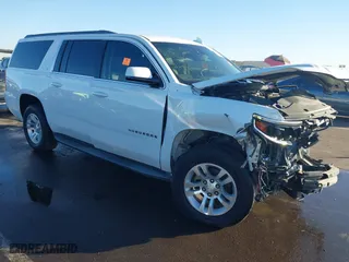 2015 Chevrolet Suburban LT with VIN 1GNSCJKC8FR592708, listed as a IAAI auction lot 41152991 with 165,381 mi miles. Bid and sale history available at carsss.com. Image 1.