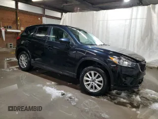 2015 Mazda CX-5 Touring with VIN JM3KE4CY1F0458911, listed as a Copart auction lot 87666255 with 0 mi miles and Salvage Title. Bid and sale history available at carsss.com. Image 4.
