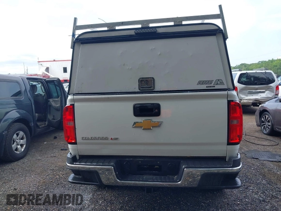 2020 Chevrolet Colorado 4WD Work Truck with VIN 1GCHTBEN7L1124744, listed as a IAAI auction lot 42755629 with 132,704 mi miles and . Bid and sale history available at DreamBid. Image 16.
