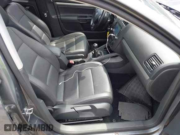 2009 Volkswagen Jetta z VIN 3VWTZ71K59M257612, wystawiony jako IAAI lot #42375908 z przebiegiem 115 420 mil mil oraz . Historia ofert i sprzedaży dostępna na DreamBid. Obrazek 5.
