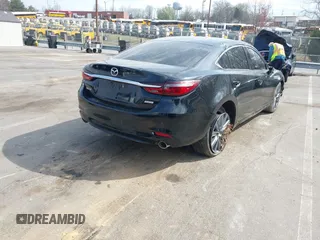 2018 Mazda 6 Touring with VIN JM1GL1VM2J1313375, listed as a IAAI auction lot 41848648 with 93,717 mi miles and . Bid and sale history available at DreamBid. Image 4.