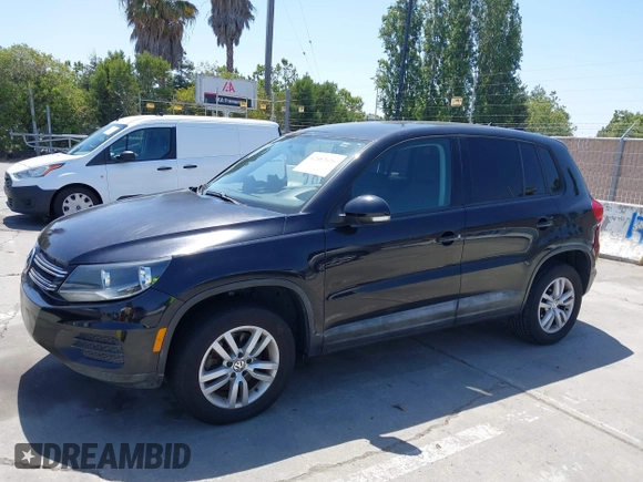 2013 Volkswagen Tiguan SE with VIN WVGAV7AXXDW542019, listed as a IAAI auction lot 42482696 with 193,383 mi miles and . Bid and sale history available at DreamBid. Image 6.
