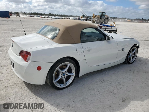 2006 BMW Z4 3.0si with VIN 4USBU53556LX00647, listed as a Copart auction lot 83436974 with 70,077 mi miles and Salvage title. Bid and sale history available at DreamBid. Image 3.