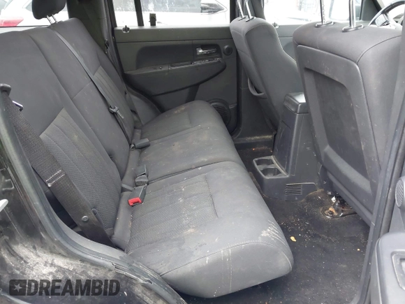 2011 Jeep Liberty Sport with VIN 1J4PN2GK2BW577724, listed as a IAAI auction lot 41032620 with 147,888 mi miles and . Bid and sale history available at carsss.com. Image 8.