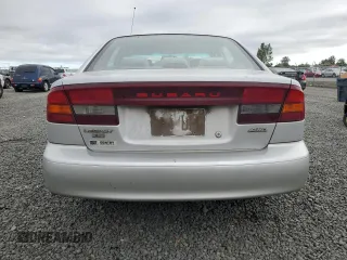 2002 Subaru Legacy L with VIN 4S3BE635727213302, listed as a Copart auction lot 58575235 with 243,886 mi miles and Salvage title. Bid and sale history available at DreamBid. Image 6.
