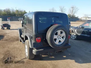 2006 Jeep Wrangler Sport with VIN 1J4FA49SX6P733671, listed as a IAAI auction lot 41779611 with 189,701 mi miles and . Bid and sale history available at carsss.com. Image 3.