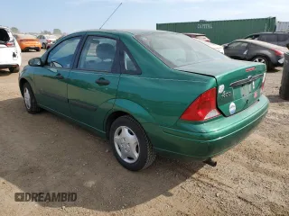 2002 Ford Focus LX with VIN 1FAFP33PX2W150929, listed as a Copart auction lot 71664474 with 61,505 mi miles and Salvage Title. Bid and sale history available at DreamBid. Image 2.
