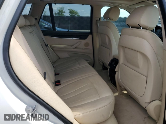 2014 BMW X5 xDrive35i z VIN 5UXKR0C51E0H17912, wystawiony jako Copart lot #61819105 z przebiegiem 218 784 mil mil oraz Czysty tytuł • Clean title. Historia ofert i sprzedaży dostępna na DreamBid. Obrazek 11.