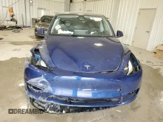 2024 Tesla Model Y Long Range с VIN 7SAYGDEE8RA270862, выставлен на аукционе Copart как лот 58099875 с пробегом 24 856 миль миль и На запчасти • Non repairable. История ставок и продаж доступна на DreamBid. Изображение 5.