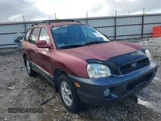 2002 Hyundai Santa Fe GLS z VIN KM8SC13D32U230286, wystawiony jako IAAI lot #41698433 z przebiegiem 151 183 mil mil oraz . Historia ofert i sprzedaży dostępna na DreamBid. Obrazek 1.